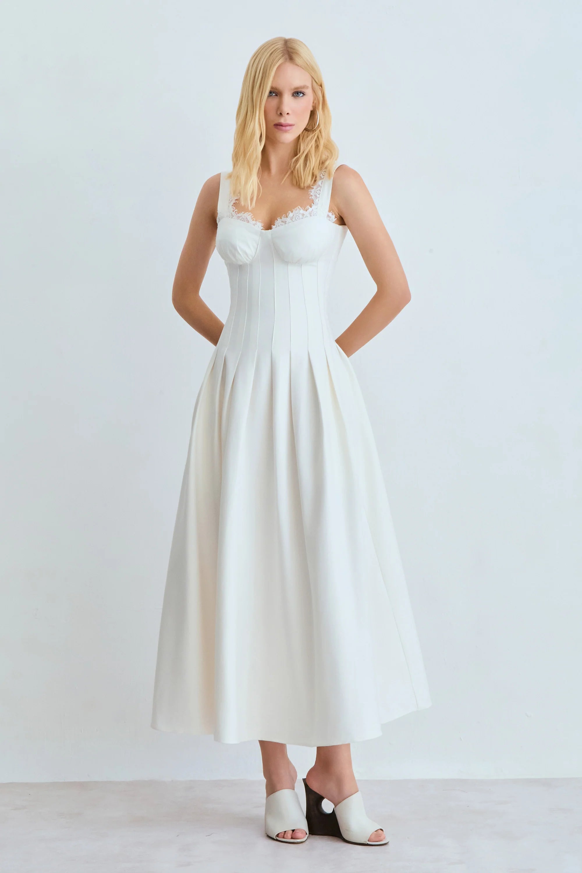 White Dress with Topstitched Cutouts and Lace Neckline