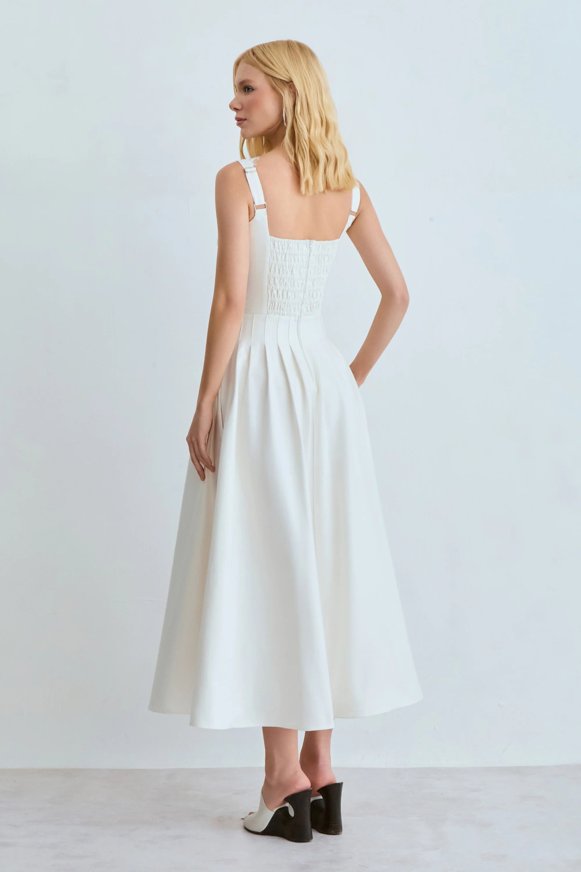White Dress with Topstitched Cutouts and Lace Neckline
