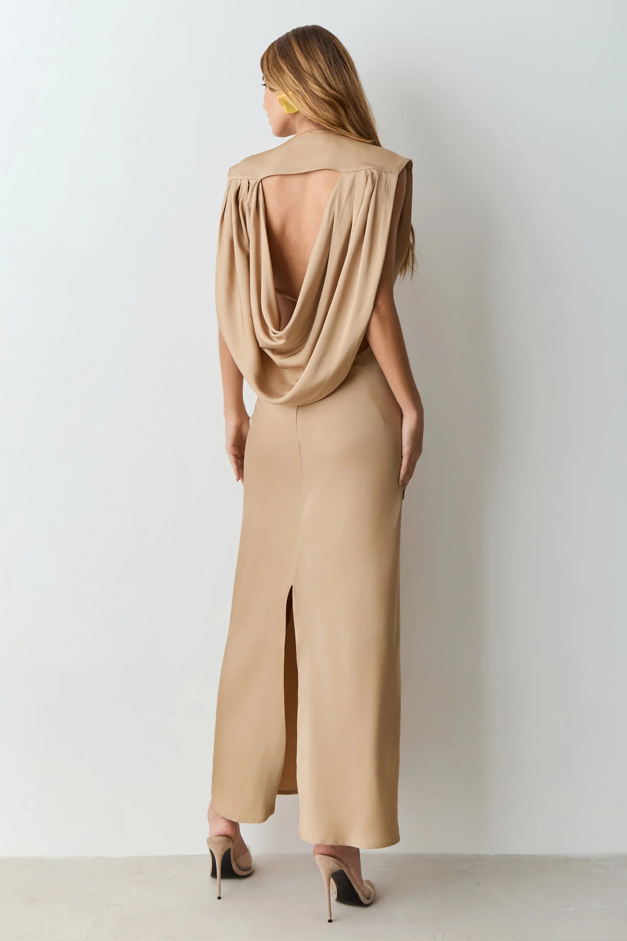 Khaki V-neck midi dress with shoulder pads and back detailing.