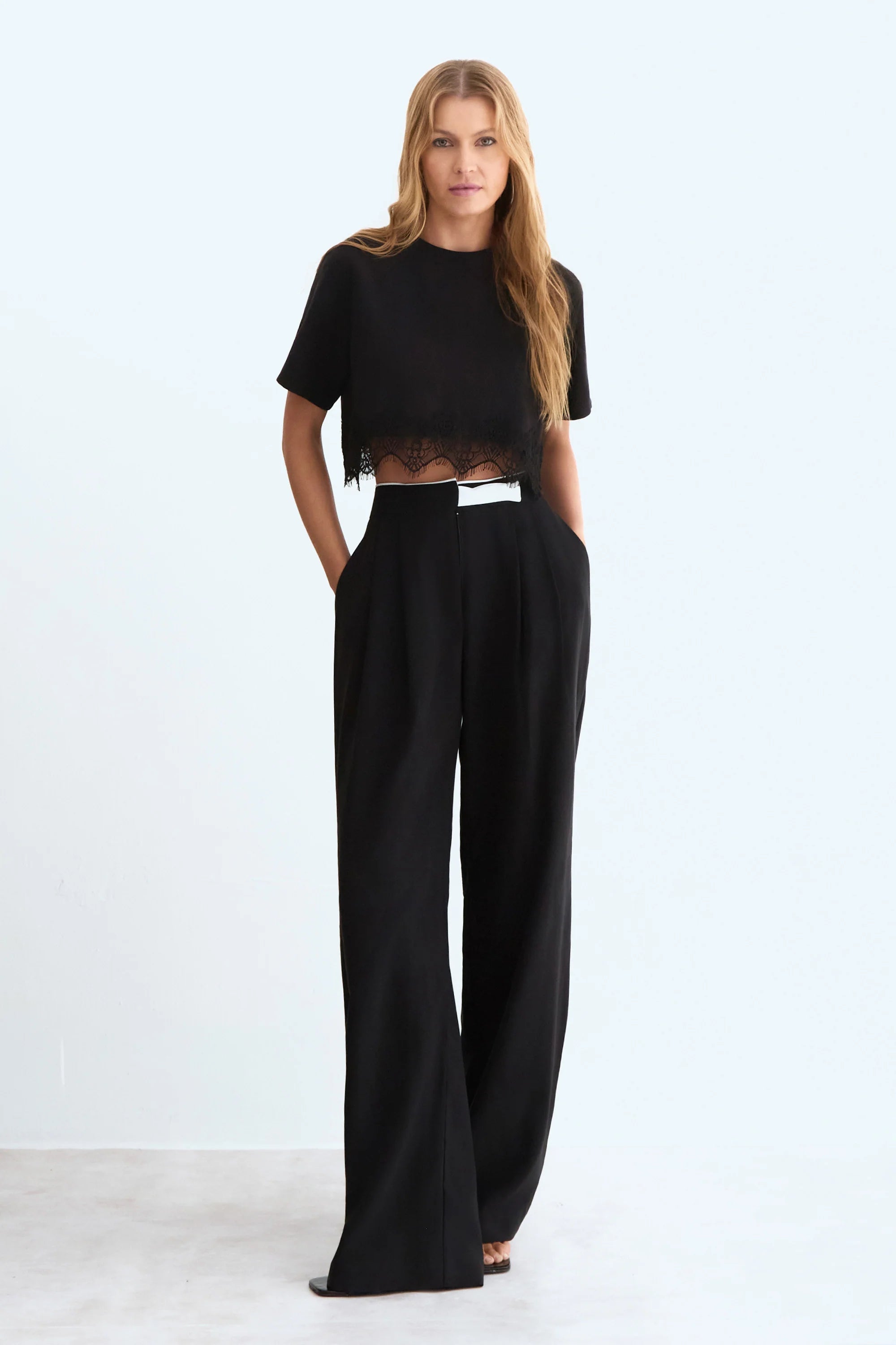 Black Straight leg Trousers with side Pockets and a Front Pleat